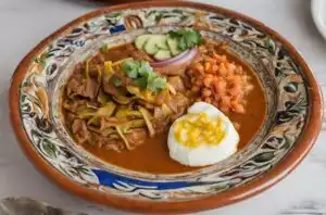 Receta de Sajta de Pollo: una danza sabrosa de especias y herencia boliviana 131 Receta de Silpancho: Armonía culinaria boliviana en un plato